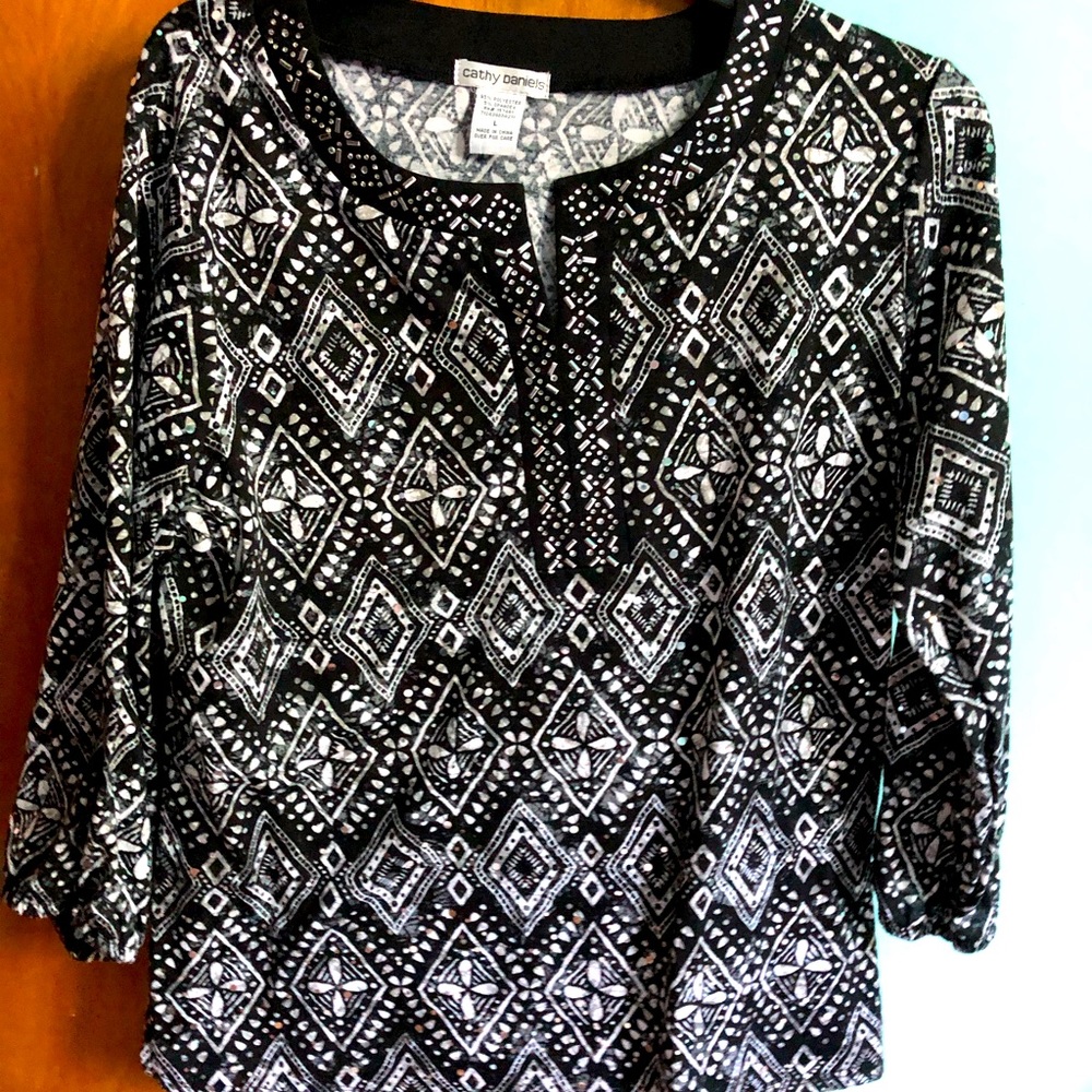 Women’s silver sequin black top